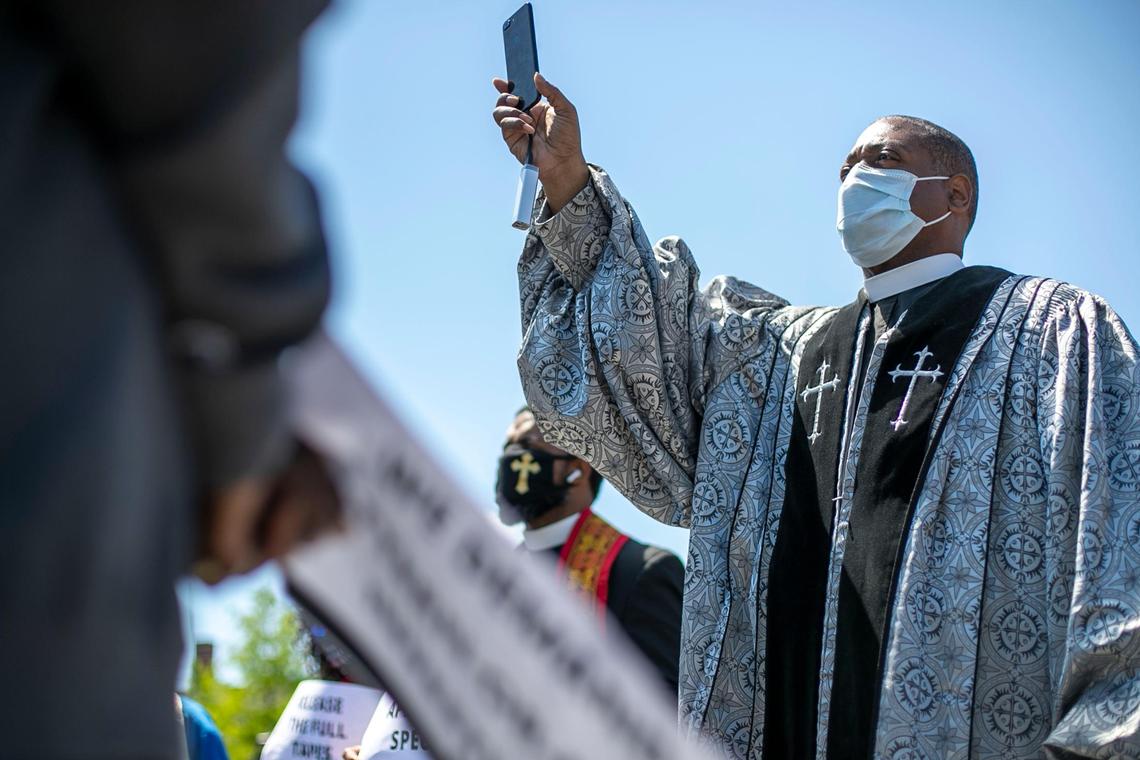 Pastor Joseph Singleton of Greenville N.C. listens to speakers during a rally demanding transparency and accountability in the death of Andrew Brown Jr. on Saturday, May 8, 2021 in Elizabeth City, N.C.