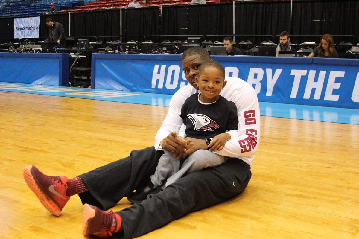 NCCU head coach LeVelle Moton hangs out on the court in Dayton with his then 4-year-old son VJ at the NCAA tournament in 2018.