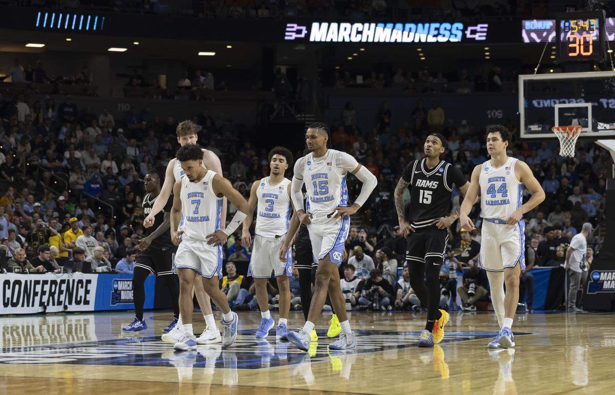 North Carolina guard Seth Trimble (7) leads his teammate down court as VCU cuts into the Tar Heels’ 19 point lead in the second half on Thursday, March 18, 2026, during the first round of the NCAA Tournament at Bon Secours Arena in Greenville, S.C.