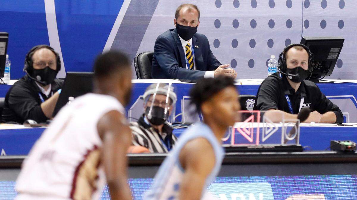 ACC commissioner Jim Phillips watches during the first half of UNCís game against Florida State in the semifinals of the ACC Menís Basketball Tournament in Greensboro, N.C., Friday, March 12, 2021.