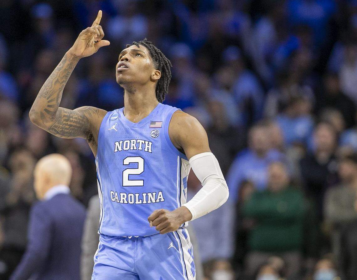 North Carolinas Caleb Love (2) reacts after a three-point basket in the second half against UCLA on Friday, March 25, 2022 during the NCAA East Regional semi-final at Wells Fargo Center in Philadelphia, Pa. Love lead the Tar Heels with 30 points in their 73-66 victory.
