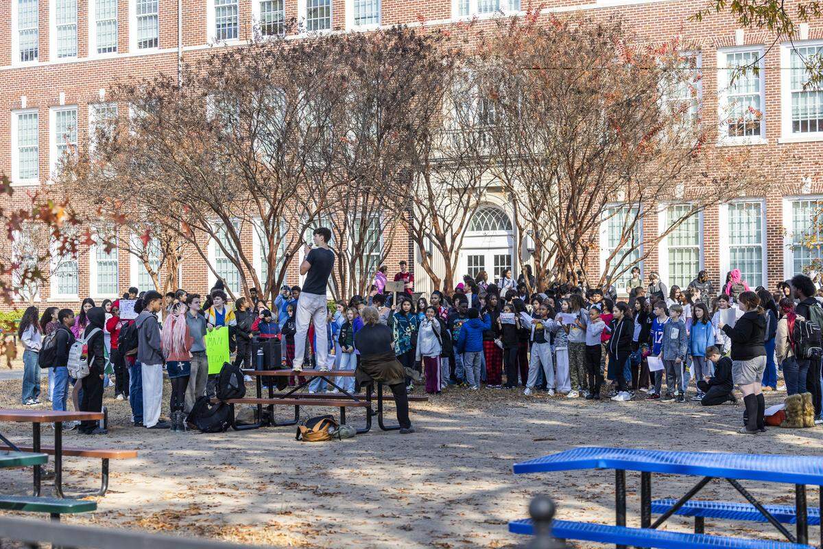 More than 200 Durham School of the Arts students stage a walkout Thursday, Nov. 20, 2025, to protest Border Patrol and ICE activity in Durham. The walkout lasted less than an hour.