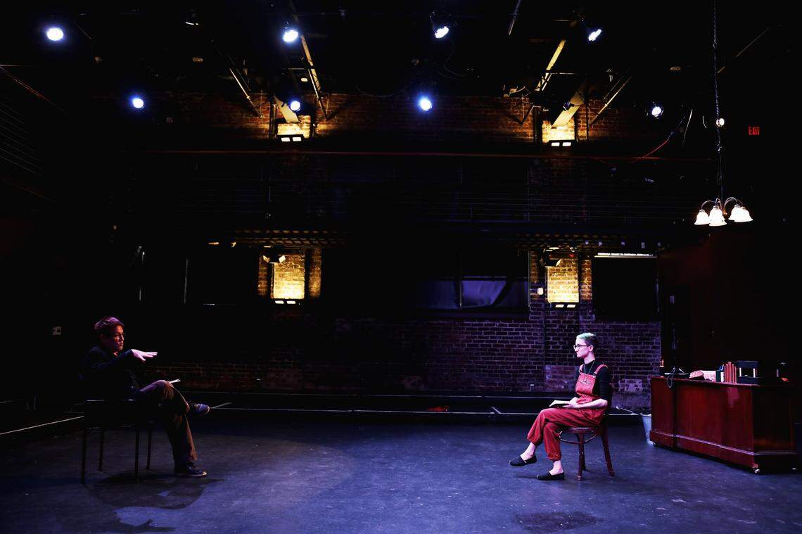 Burning Coal Theatre Company’s artistic director, Jerome Davis, left, goes over lines with actress Kimmy Fiorentino, right, from a safe social distance on Thursday, Aug. 27, 2020. Fiorentino plays Rory in the upcoming production of “A Hundred Words for Snow.”