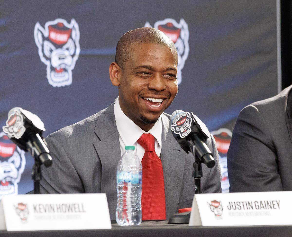 New N.C. State men’s basketball head coach Justin Gainey smiles during a press conference at Lenovo Center on Wednesday, April 1, 2026, in Raleigh, N.C.