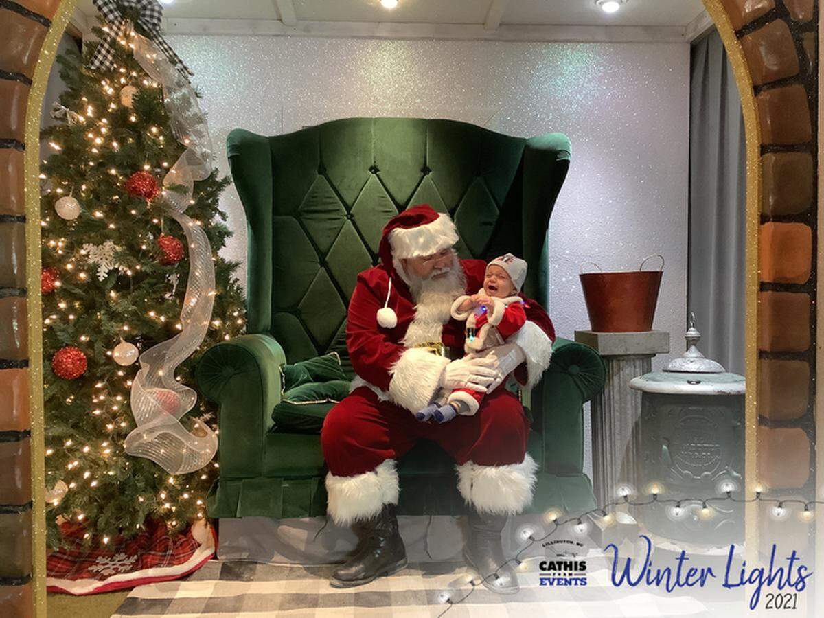 Darlene Mannise’s great-grandson with Santa.