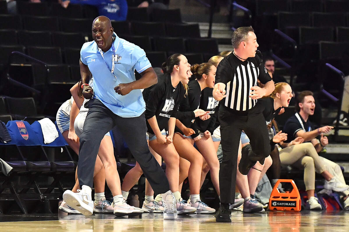 Hoggard head coach Boubacar Aw and the bench react to a call against Wakefield in the second half. The Wakefield Wolverines and the Hoggard Vikings met in the NCHSAA 4A East Regional Final in Winston-Salem, N.C. on March 12, 2025. Wakefield wins 31-23.