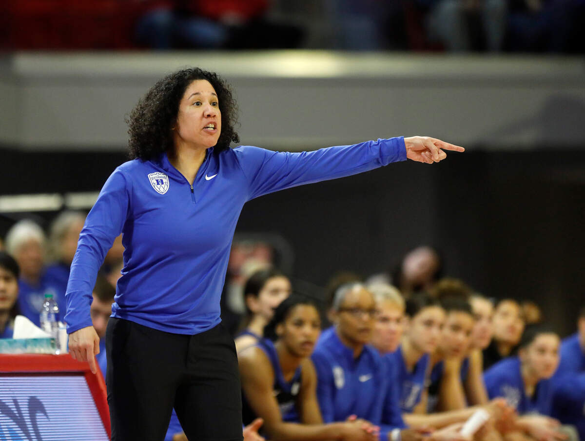 Duke head coach Kara Lawson gives instructions from the sideline during the second half of the Blue Devils’ 72-57 loss to N.C. State on Sunday, Jan. 21, 2024, at Reynolds Coliseum in Raleigh, N.C.