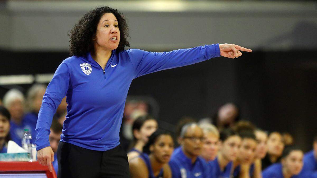 Duke head coach Kara Lawson gives instructions from the sideline during the second half of the Blue Devils’ game at N.C. State on Sunday, Jan. 21. Lawson’s team rallied to beat rival UNC at home on Sunday, Feb. 11.