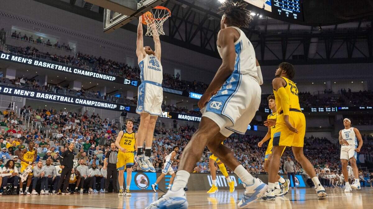 North Carolinas Brady Manek (45) gets a dunk in the half against Marquette on Thursday, March 17, 2022 during the NCAA Tournament at Dickies Arena in Ft. Worth, TX. Manek lead all scores with 28 points in the Tar Heels 95-63 victory.