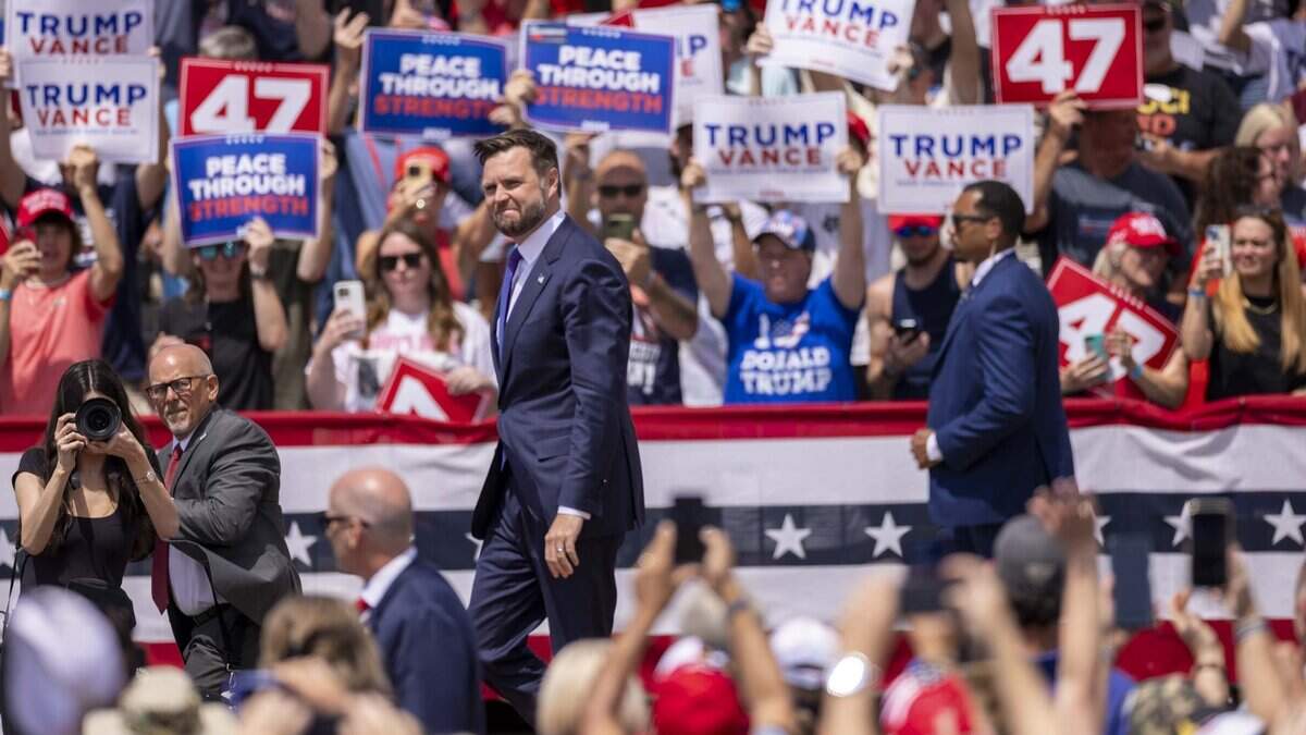 Sen. JD Vance, former President Donald Trump’s running mate, takes the stage during a rally at the North Carolina Aviation Museum & Hall of Fame in Asheboro, NC on Wednesday, Aug. 21, 2024.