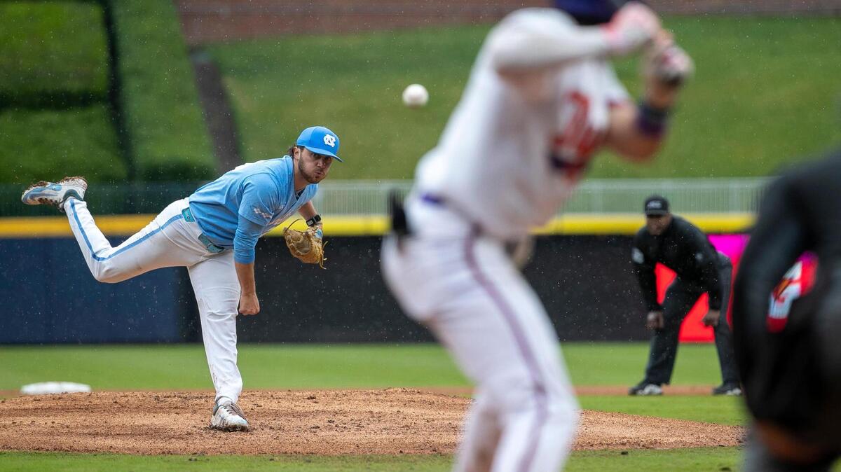 North Carolina pitcher Kevin Eaise (29) works from the mound against Clemson’s Blake Wright (8) in the ACC Baseball Championship. Eaise pitched well in relief Friday against Iowa, but the Tar Heels’ ninth-inning rally fell short in a loss to the Hawkeyes.