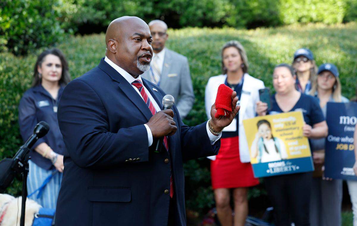 Republican Lt. Gov. Mark Robinson, who is running for governor, speaks at a Moms for Liberty rally outside the Legislative Building in Raleigh, N.C., Wednesday, June 12, 2024.
