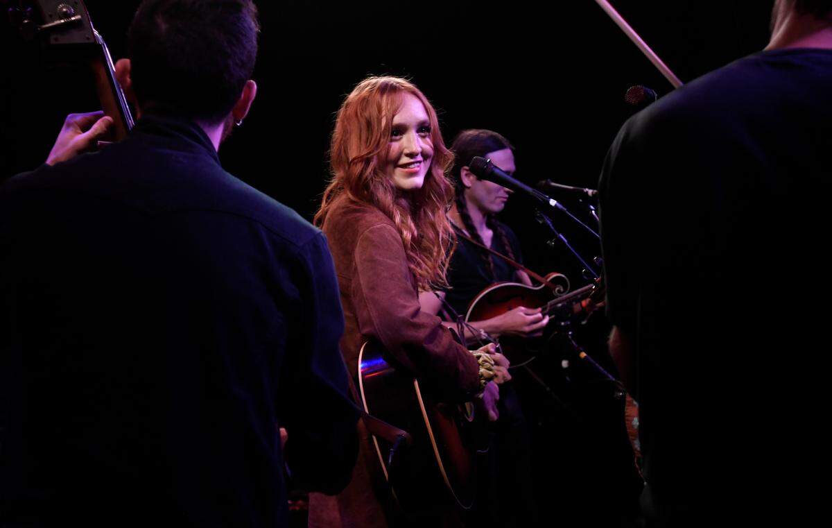 Bella White plays for the crowd at The Pour House at IBMAÕs Bluegrass Ramble in downtown Raleigh, N.C. Tuesday evening, Sept. 28, 2021.