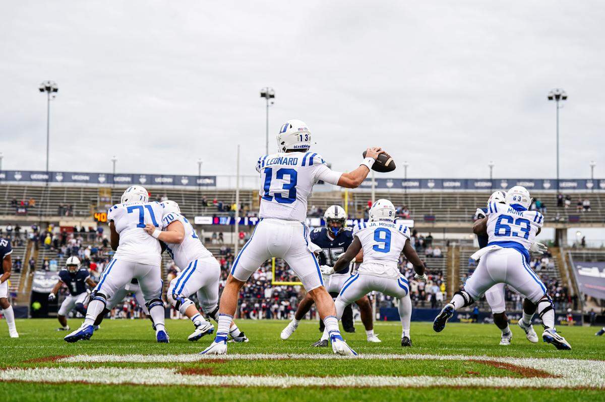 Sep 23, 2023; East Hartford, Connecticut, USA; Duke Blue Devils quarterback Riley Leonard (13) throws a pass against the UConn Huskies at Rentschler Field at Pratt & Whitney Stadium. Mandatory Credit: David Butler II-USA TODAY Sports