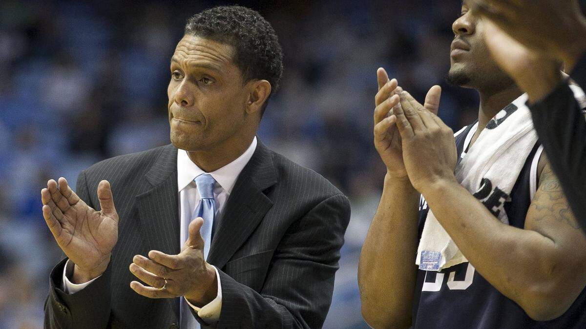 Monmouth head coach King Rice, a former North Carolina player, applauds his team’s performance during the first half against North Carolina on Wednesday, December 28, 2016 at the Smith Center in Chapel Hill, N.C.