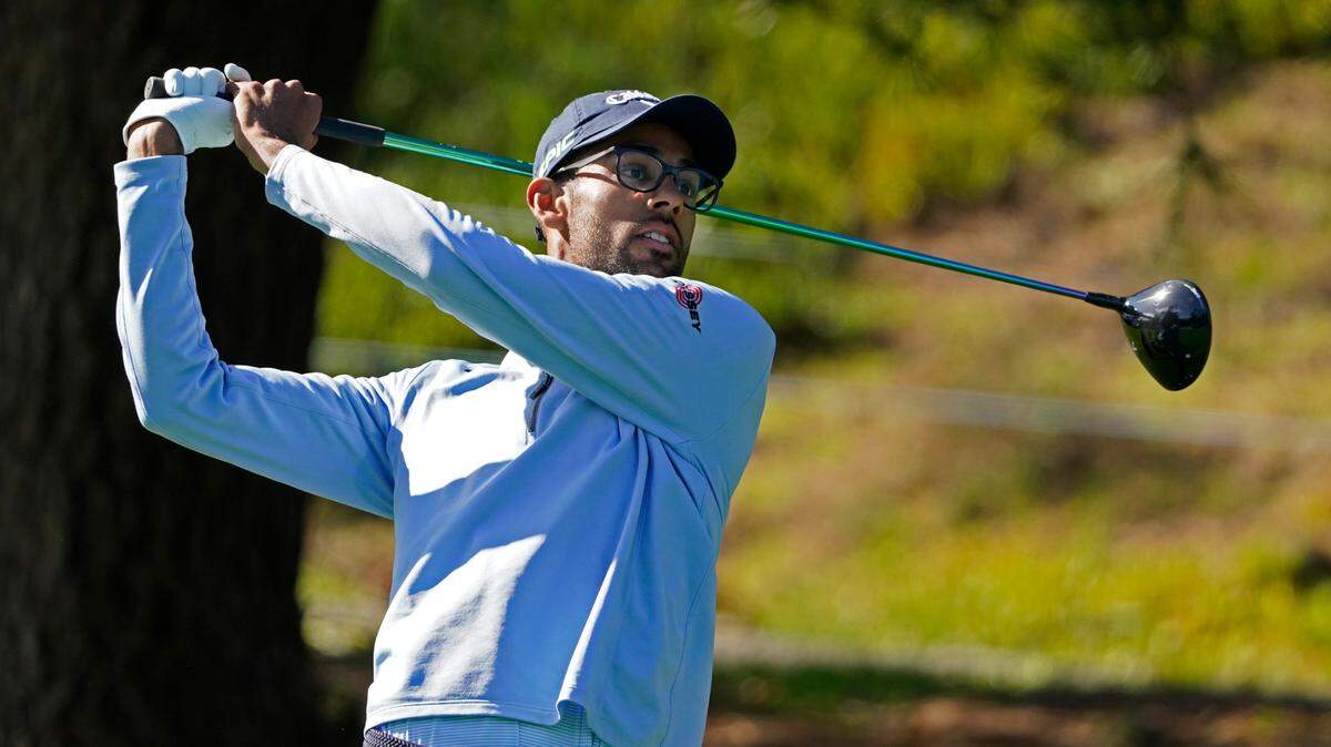Akshay Bhatia follows his drive from the first tee of the Spyglass Hill Golf Course during the second round of the AT&T Pebble Beach Pro-Am golf tournament Friday, Feb. 12, 2021, in Pebble Beach, Calif. (AP Photo/Eric Risberg)