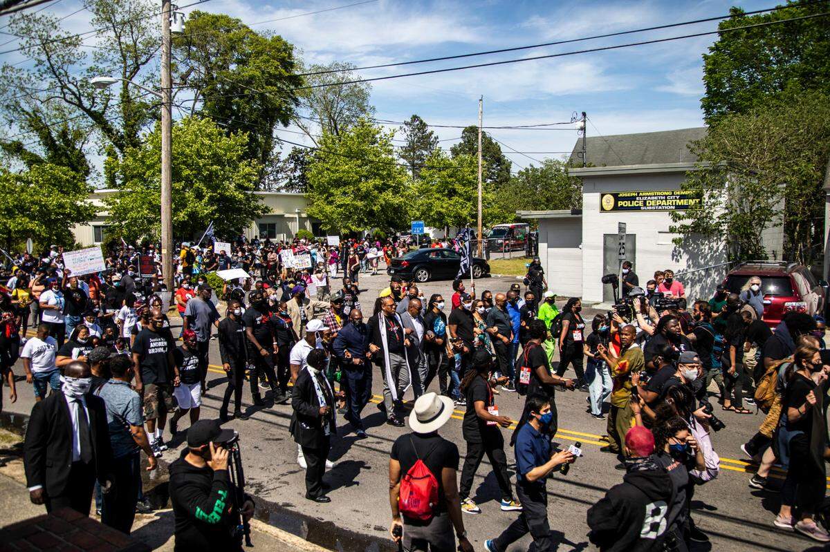 Hundreds of demonstrators led by Andrew Brown Jr.Õs family and Rev. Greg Drumwright, march Sunday, May 2, 2021 to the site where Brown was shot and killed by Pasquotank County Sheriff deputies. BrownÕs funeral will be held Monday.