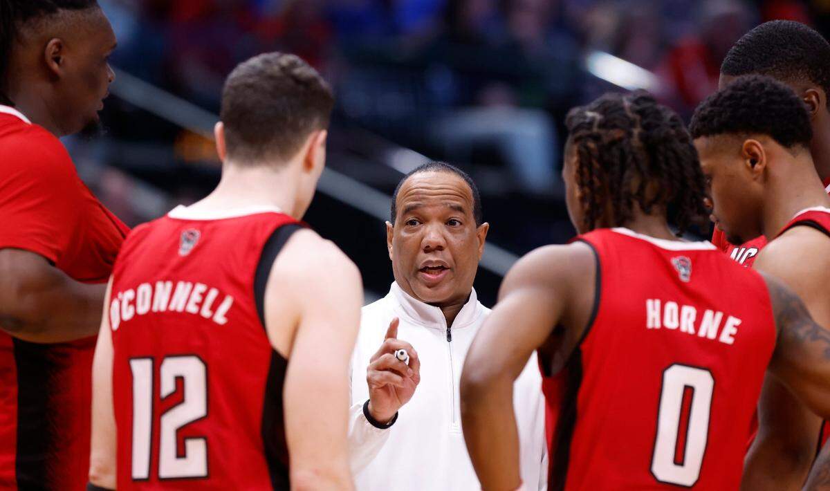 N.C. State head coach Kevin Keatts talks to his team during the second half of N.C. State’s 67-58 victory over Marquette in their NCAA Tournament Sweet 16 game at the American Airlines Center in Dallas, Texas, Friday, March 29, 2024.