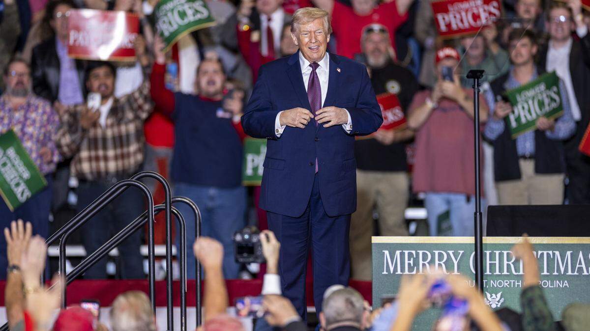 President Donald Trump takes the stage during a rally at the Rocky Mount Event Center in Rocky Mount on Friday, Dec. 19, 2025.