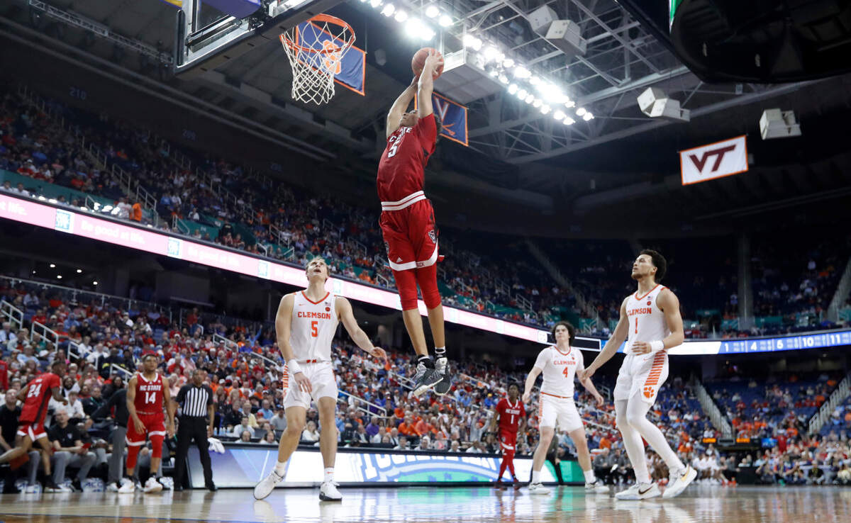 N.C. State’s Jack Clark (5) heads to slam in two during Clemson’s 80-54 victory over N.C. State in the quarterfinals of the ACC Men’s Basketball Tournament in Greensboro, N.C., Thursday, March 9, 2023.