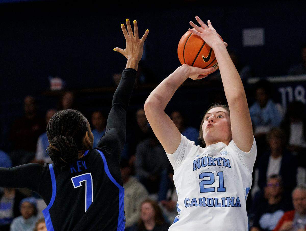 North Carolina’s Ciera Toomey shoots over Kentucky’s Teonni Key during the first half of the Tar Heels’ 72-53 win on Thursday, Dec. 5, 2024, at Carmichael Arena in Chapel Hill, N.C.
