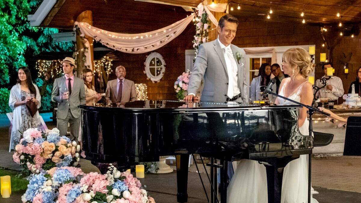 Robert Gant and Debbie Gibson in the Hallmark movie “Wedding of Dreams.”