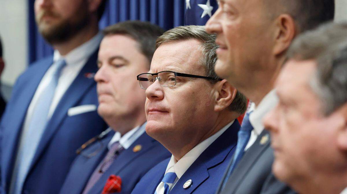North Carolina House Speaker Tim Moore, center, listens during a press conference on March 29, 2023 where Moore and the House Republican budget chairs talked about their state budget proposal.