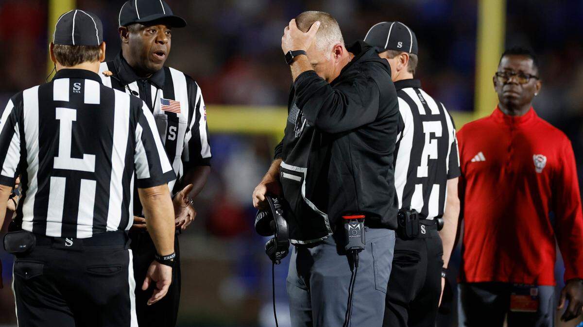 N.C. State head coach Dave Doeren is not happy with the call by officials during the first half of N.C. State’s game against Duke at Wallace Wade Stadium in Durham, N.C., Saturday, Oct. 14, 2023.