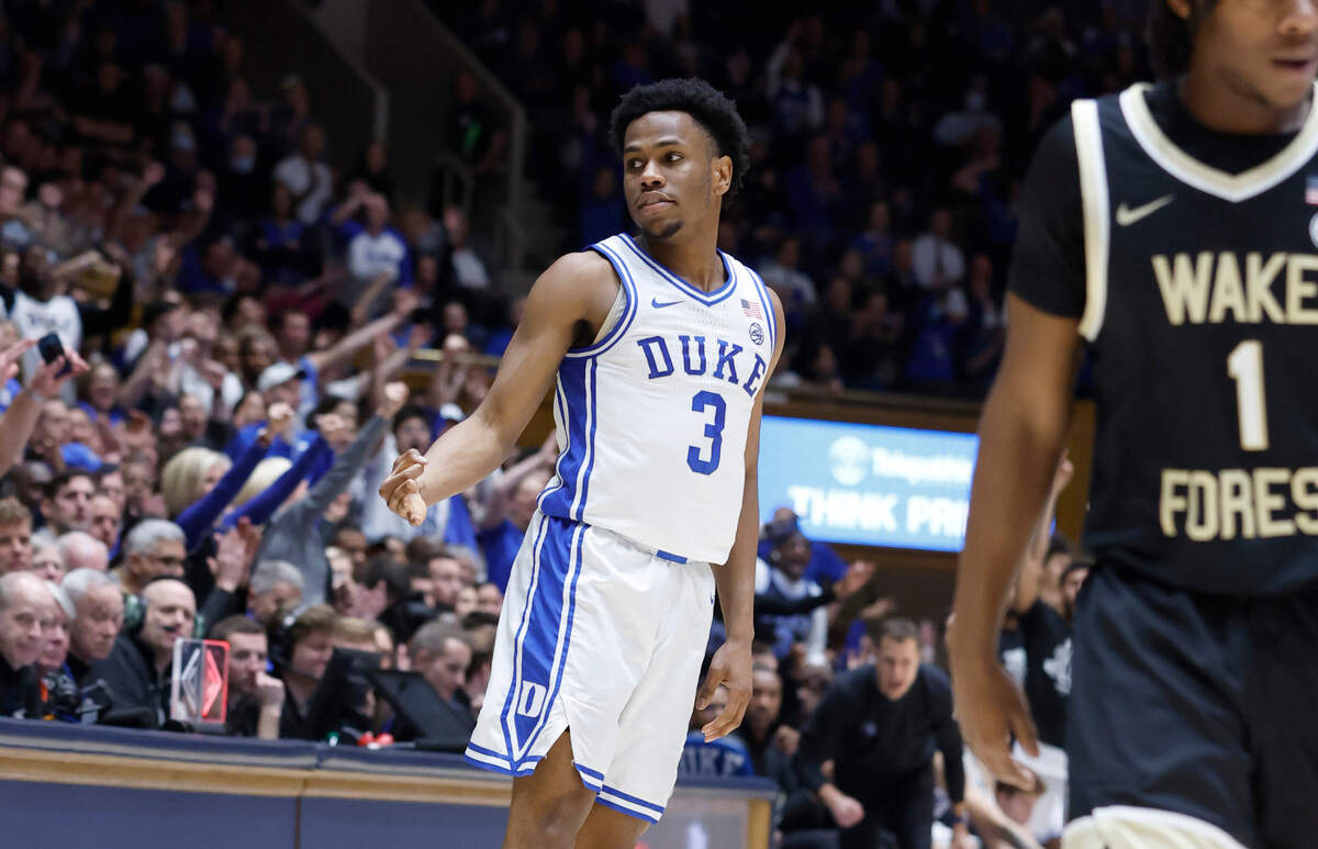 Duke’s Jeremy Roach (3) looks back at the Wake bench after hitting a three-pointer during the first half of Duke’s game against Wake Forest at Cameron Indoor Stadium in Durham, N.C., Tuesday, Jan. 31, 2023.