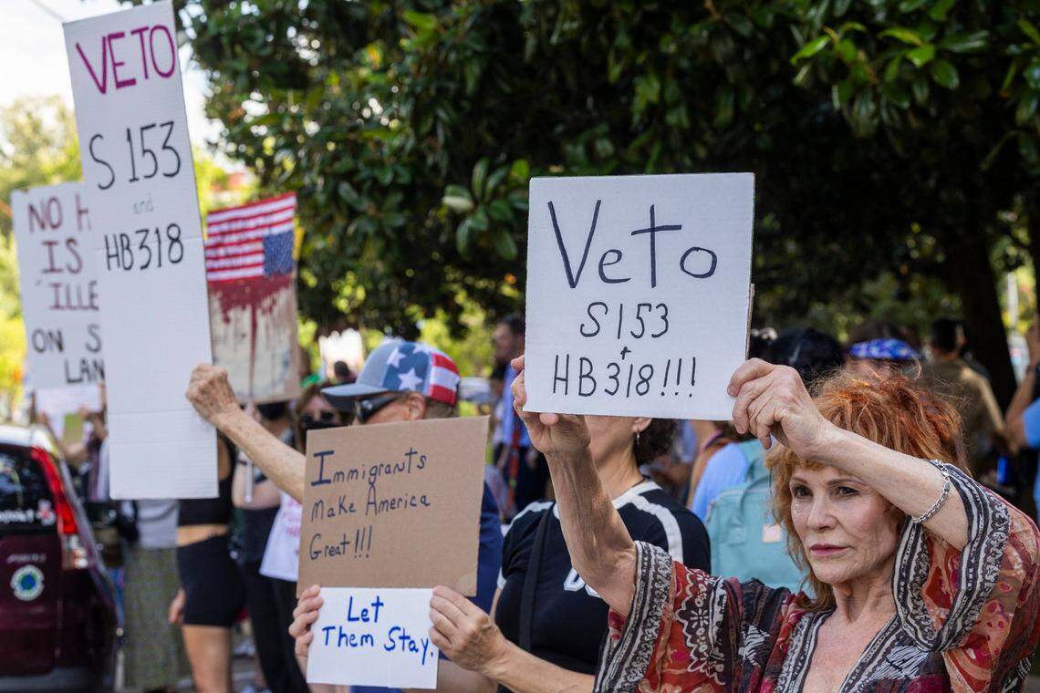 More than 100 demonstrators rallied outside the Executive Mansion in downtown Raleigh on Wednesday, June 18, 2025, urging Gov. Josh Stein to veto two GOP-backed bills that would expand state and local law enforcement cooperation with U.S. Immigration and Customs Enforcement.