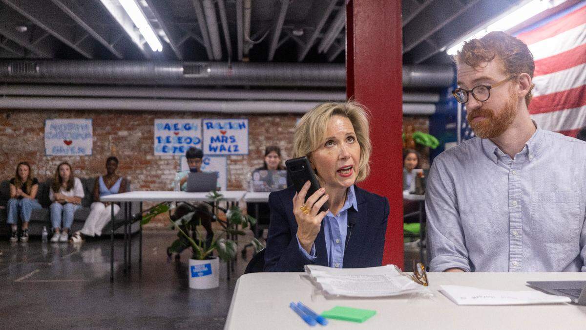 Minnesota first lady Gwen Walz makes phone calls at a campaign call center in Raleigh as she and second gentleman Doug Emhoff campaign on behalf of their spouses as part of the “Fighting for Reproductive Freedom” bus tour stop on Monday, Sept. 9, 2024. The visit comes less than 48 hours before Vice President Kamala Harris and former President Donald Trump face off in their first debate on Tuesday night, and as new polls indicate that North Carolina is a “toss-up” state in a tight election.