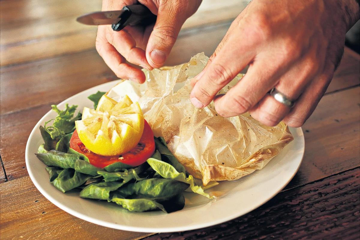 Breakaway Cafe in Chapel Hill has a fine rendition of a classic fish en papillote: cod, steamed in parchment with carrots, tomatoes and thinly sliced potatoes.