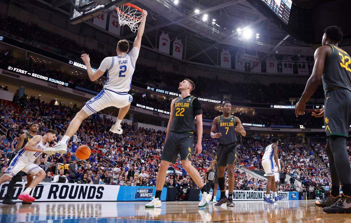 Duke’s Cooper Flagg (2) slams in two during the first half of Duke’s game against Baylor in the second round of the 2025 NCAA men’s basketball championship at the Lenovo Center in Raleigh, N.C., Sunday, March 23, 2025.