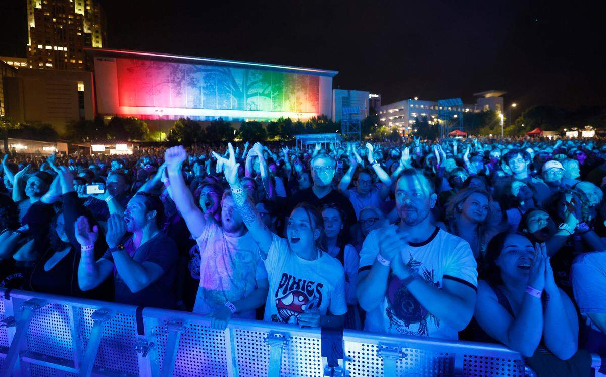 The crowd cheers on the Pixies as they play at Red Hat Amphitheater in Raleigh, N.C., during their North American tour on Friday, June 16, 2023.