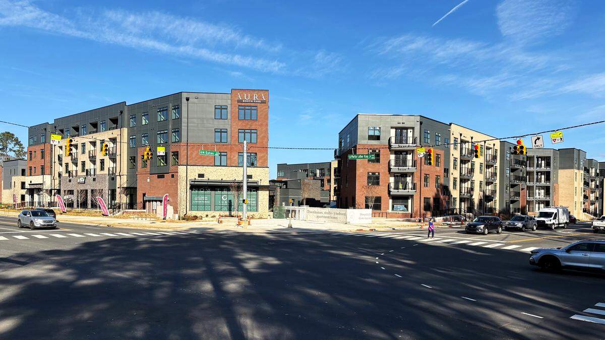Aura Booth Park is bringing apartments, townhomes, and more retail and restaurant space to the corner of Estes Drive and Martin Luther King Jr. Boulevard in Chapel Hill, NC. The project marks a big change for the busy commuter corridor.
