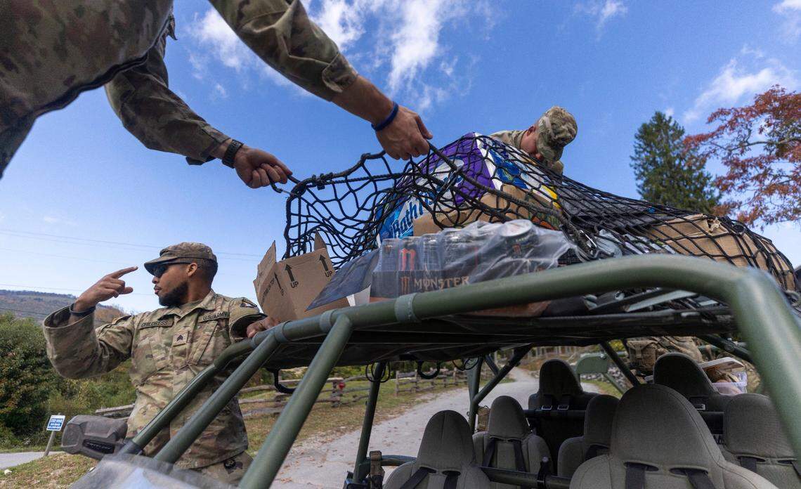 Soldiers with the 101st Airborne Division Air Assault, 2nd Brigade Combat Team, from Fort Campbell, Kentucky, use Infantry Squad Vehicles to deliver water, food, toiletries, and other aid to residents in the Soco Gap community in Maggie Valley on Tuesday, October. 8, 2024. The team has been using the Maggie Valley Pavilion and Town Hall as a distribution base for relief efforts in the town following Tropical Storm Helene.