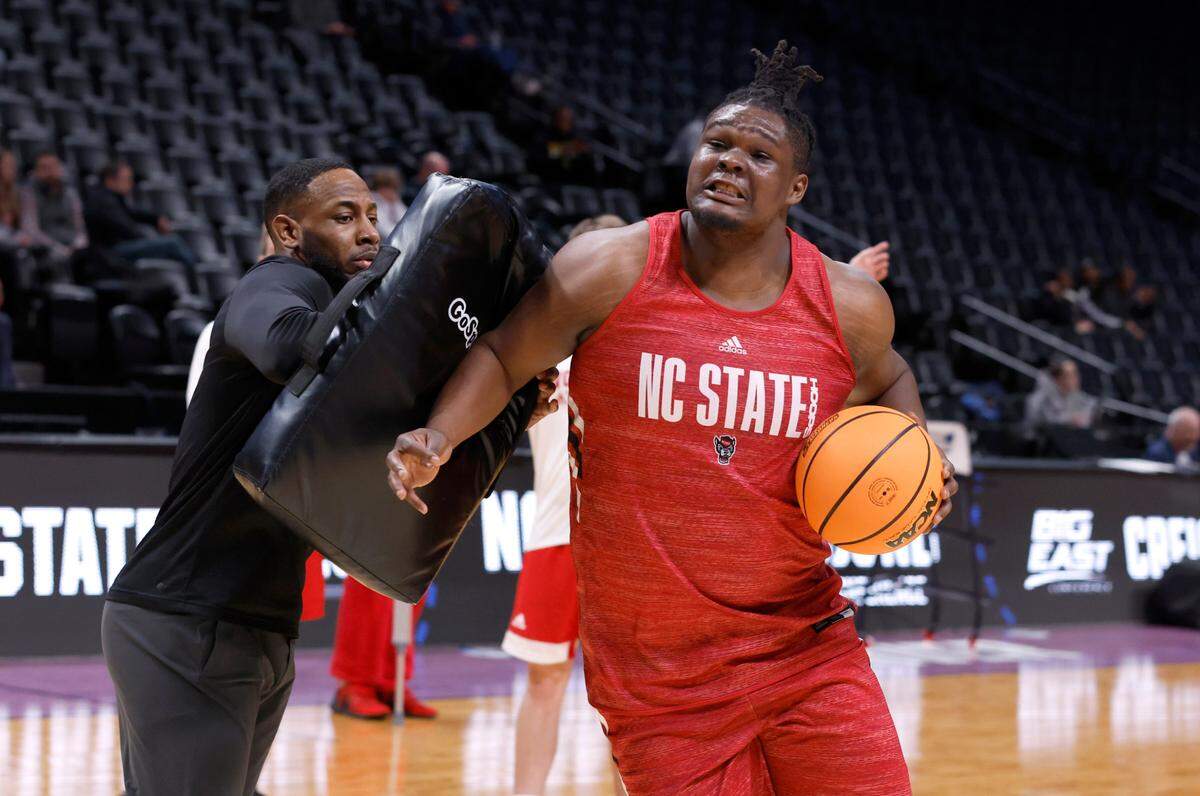 N.C. State’s D.J. Burns Jr. (30) runs drills during N.C. State’s practice day at Ball Arena in Denver, Co. Thursday, March 16, 2023. The Wolfpack will face Creighton in the first round of the NCAA Tournament Friday.