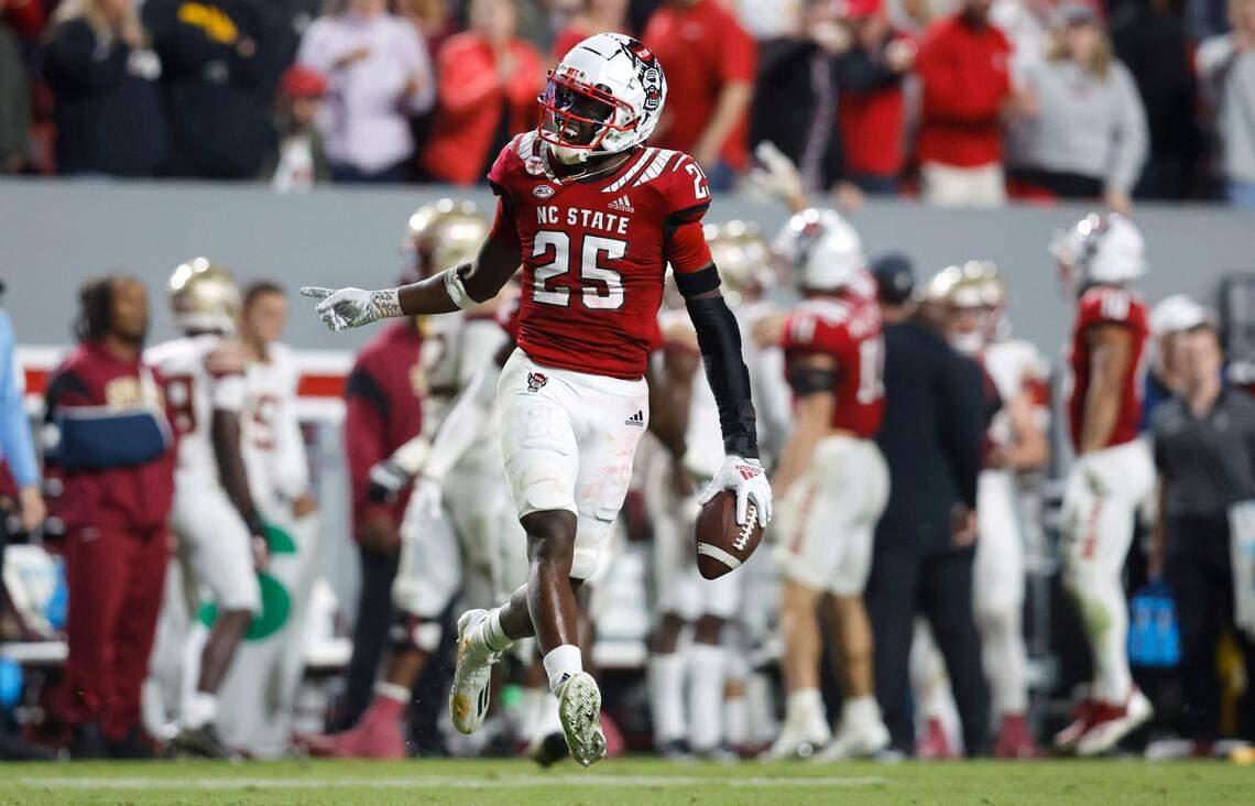 N.C. State cornerback Shyheim Battle (25) celebrates after intercepting the ball during the second half of N.C. State’s 19-17 victory over Florida State at Carter-Finley Stadium in Raleigh, N.C., Saturday, Oct. 8, 2022.