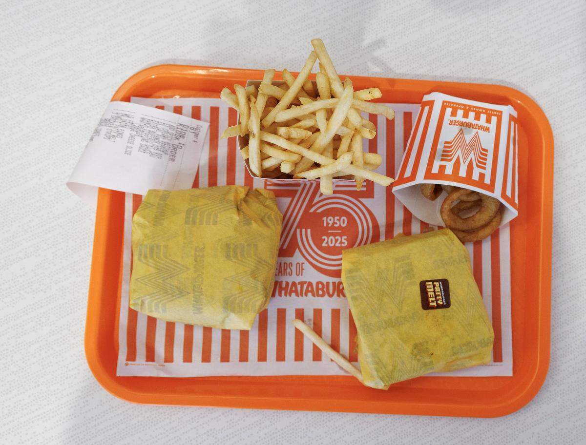 A Whataburger, french fries, onion rings and a Whataburger Patty Melt are pictured at Whataburger in Mebane, N.C. on Monday, Dec. 15, 2025.