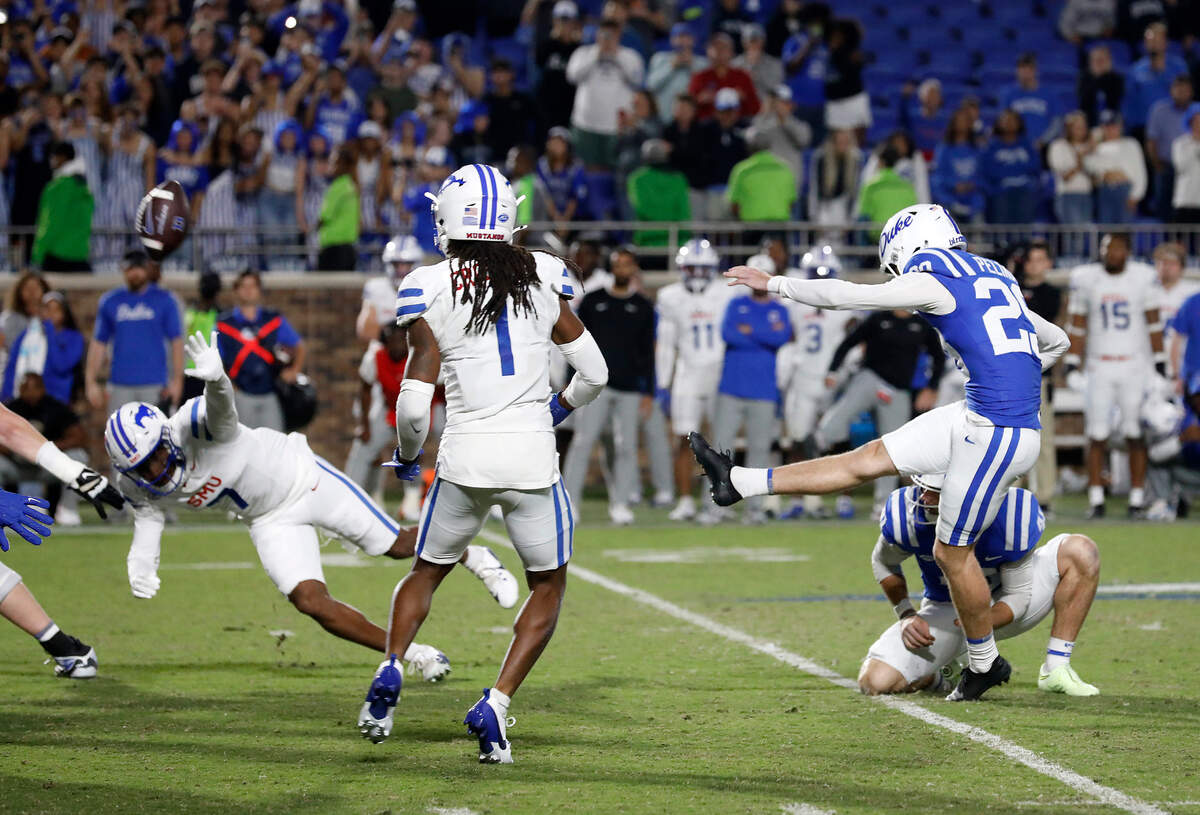 Southern Methodist blocks a field goal by Duke’s Todd Pelino at the close of the fourth quarter during the Blue Devils’ 28-27 loss on Saturday, Oct. 26, 2024, at Wallace Wade Stadium in Durham, N.C.