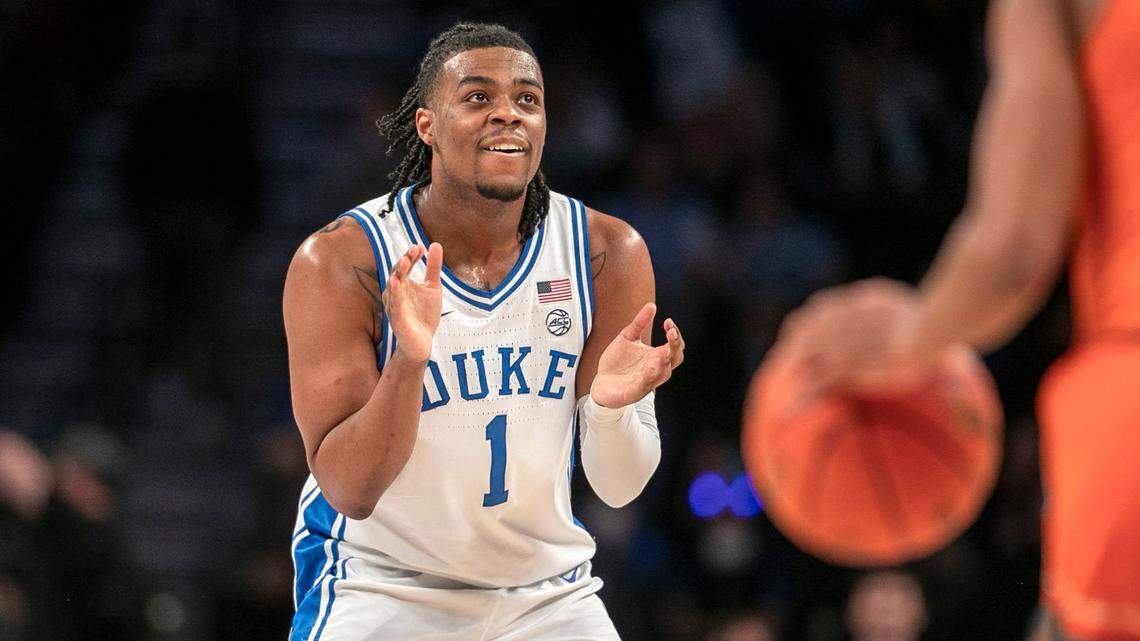 Dukeís Trevor Keels (1) reacts after a basket by teammate A.J. Griffin (21) to tie the score 32-32 against Miami in the first half during the semi-finals of the ACC Tournament on Friday, March 11, 2022 at Barclays Center in Brooklyn, N.Y.