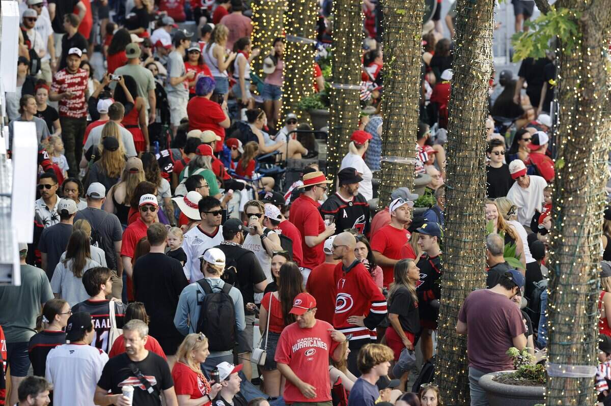 Crowds line up on Fayetteville St. before a parade and rally for the Carolina Hurricanes in downtown Raleigh Saturday, June 20, 2026.