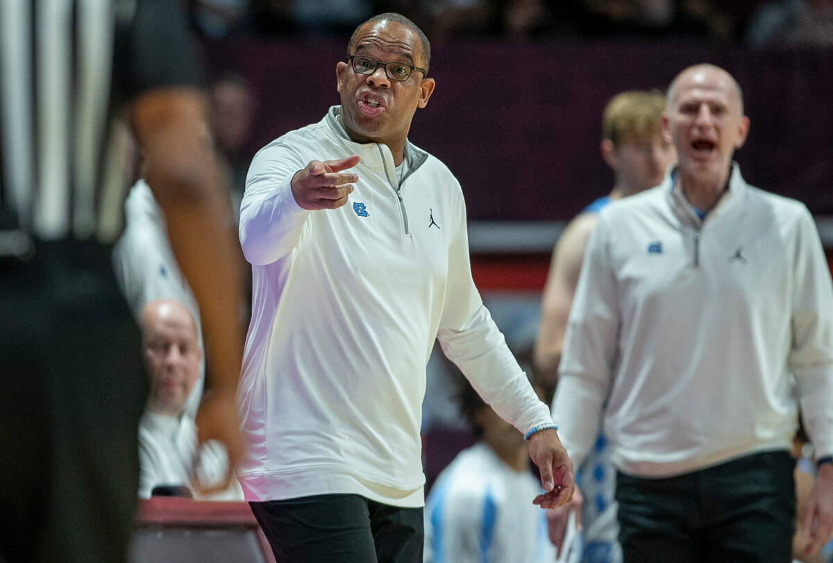 North Carolina coach Hubert Davis questions a foul against his team in the first half against Virginia Tech on Sunday, December 4, 2022 at Cassell Coliseum in Blacksburg, Va.