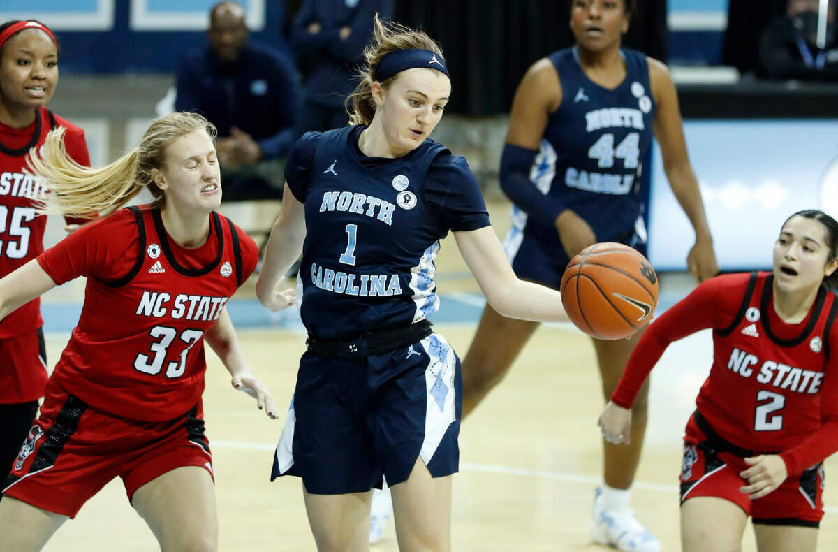 North Carolina’s Alyssa Ustby (1) pulls in the rebound during the second half of UNC’s 76-69 victory over N.C. State at Carmichael Arena in Chapel Hill, N.C., Sunday, February 7, 2021.