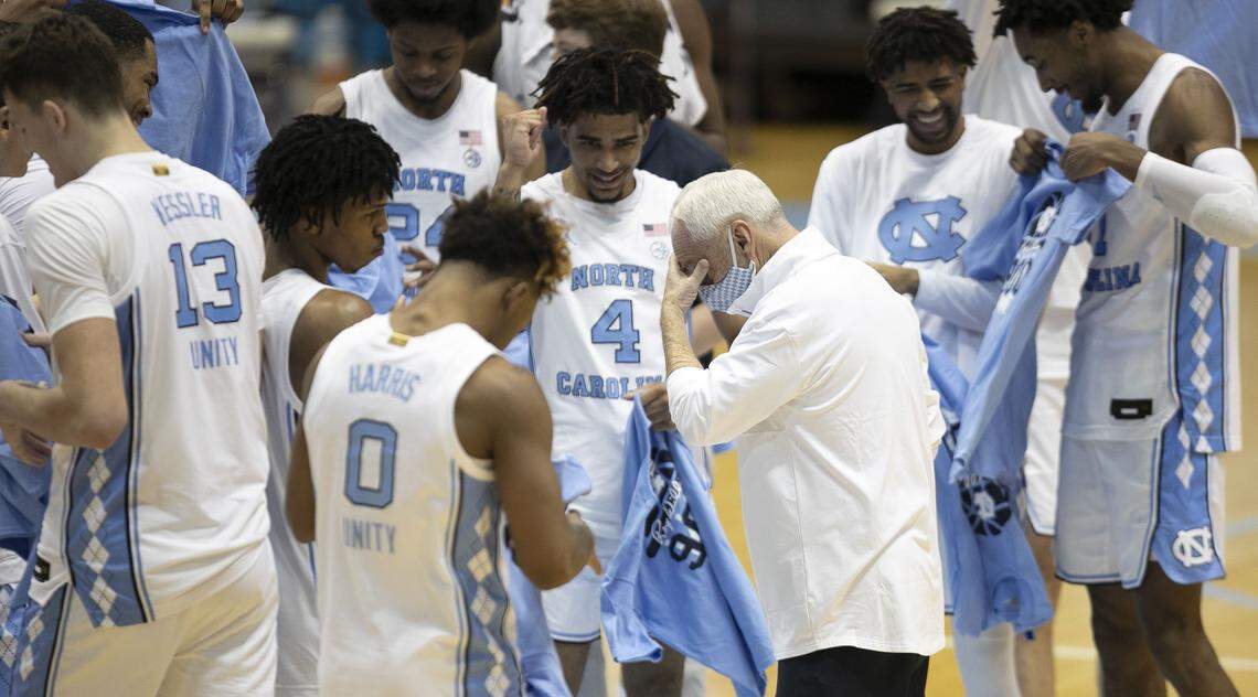 North Carolina coach Roy Williams reacts as he honored for his 900th career win following the Tar Heels’ 78-70 win over Florida State on Saturday, February 27, 2021 in Chapel Hill, N.C.