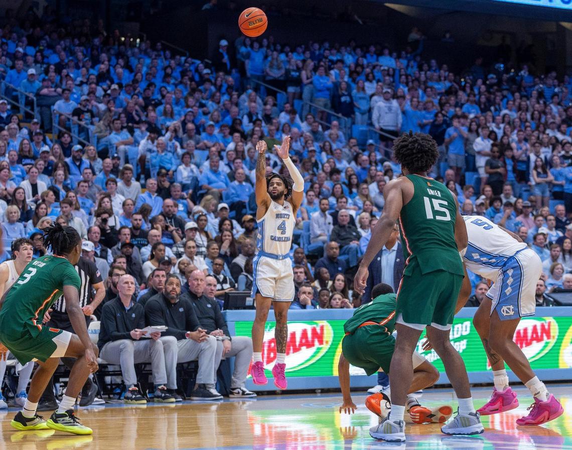 North Carolina’s R.J. Davis (4) launches a wide open three-point shot in the second half against Miami on Monday, February 26, 2024 at the Smith Center in Chapel Hill, N.C. Davis led North Carolina with 42 points in their 75-71 victory.