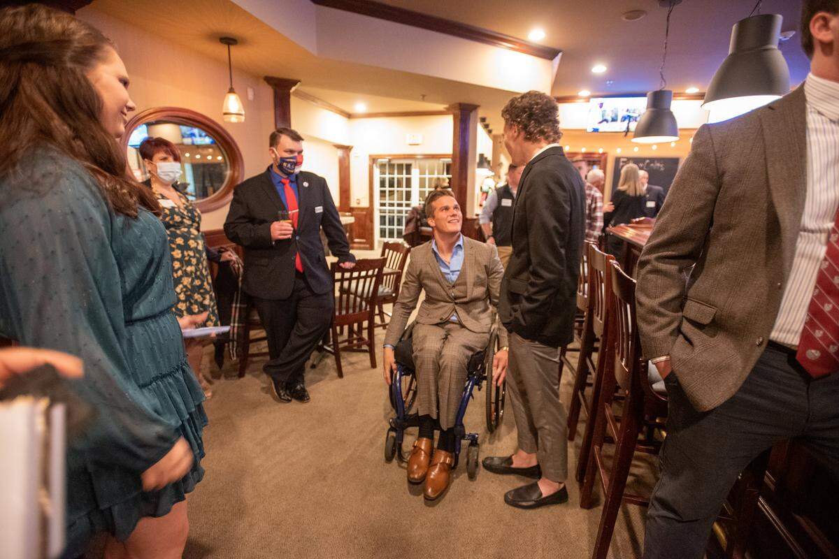 The North Carolina Federation of Young Republicans hold a holiday awards dinner Dec. 18, 2020, in Carthage, North Carolina. New Republican Congressman Madison Cawthorn was a featured speaker.