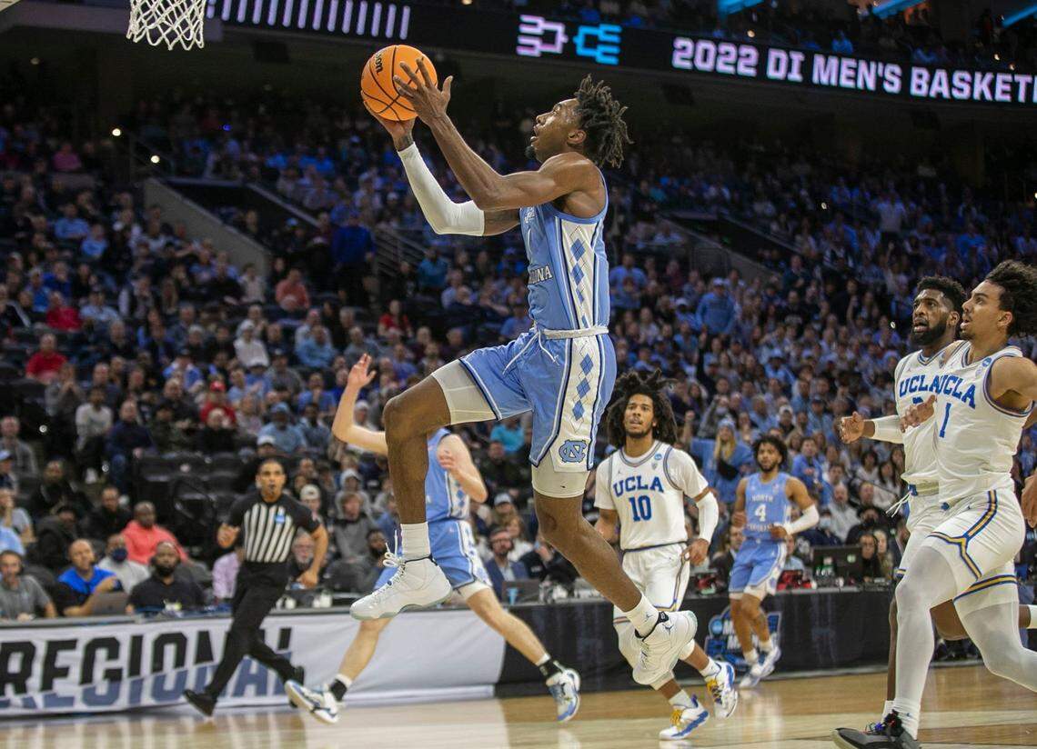 North Carolina’s Leaky Black (1) breaks to the basket ahead of UCLA’s Jules Bernard (1) during the first half on Friday, March 25, 2022 during the NCAA East Regional semi-final at Wells Fargo Center in Philadelphia, Pa.