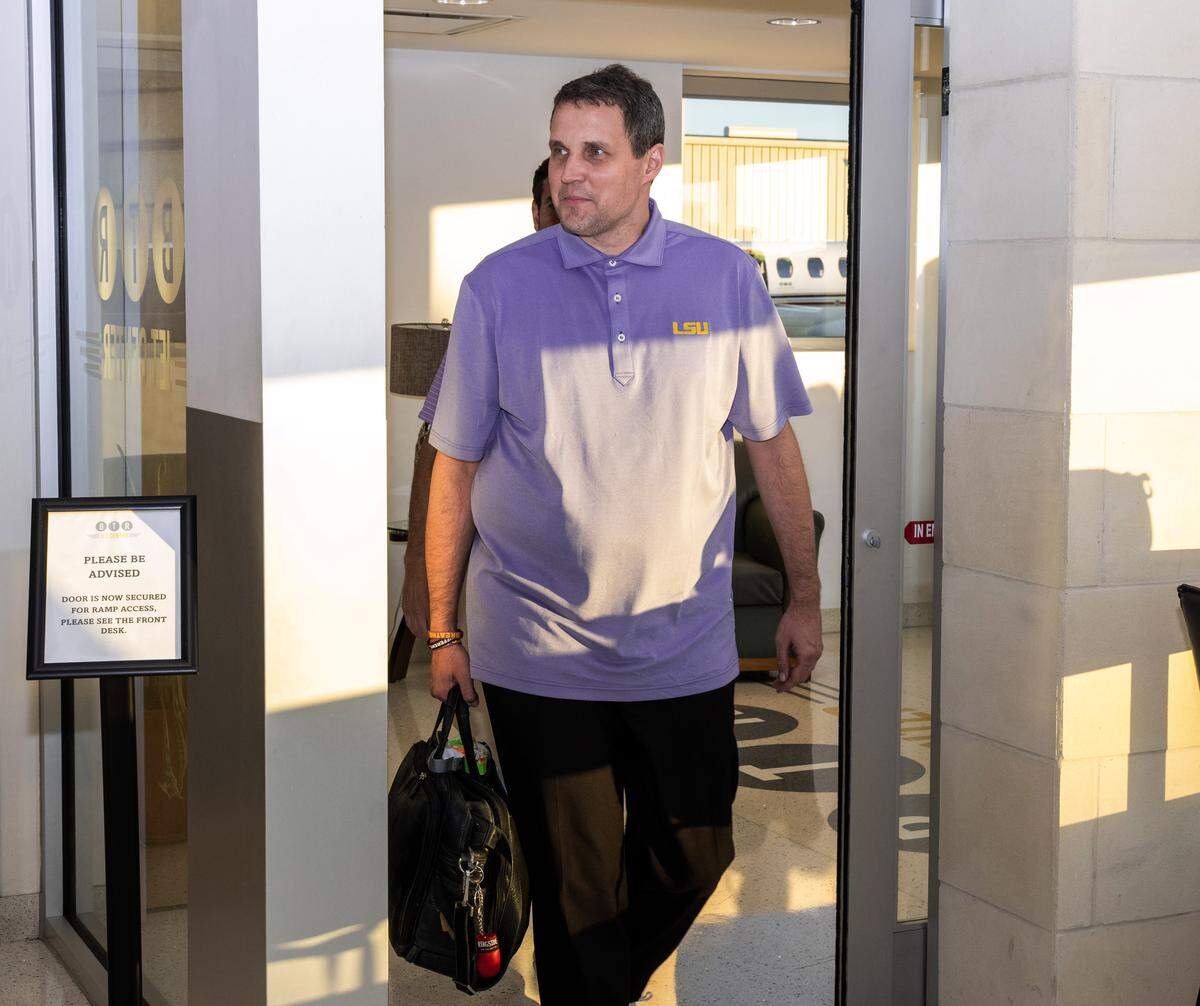 Will Wade walks into the airport terminal after arriving fro North Carolina on Thursday, March 26, 2026 at the BTR Jet Center in Baton Rouge, Louisiana.