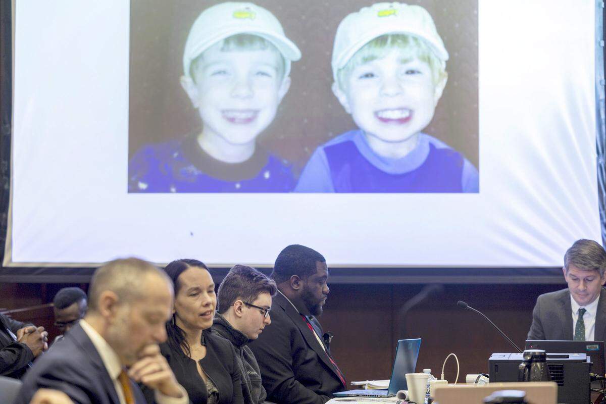 A photograph of brothers James Thompson, left, and Austin Thompson as children is introduced into evidence during a sentencing hearing in Wake County Superior Court on Tuesday, Feb. 10, 2026, as defense attorneys present evidence for Austin Thompson, an 18-year-old man who pleaded guilty in the 2022 Hedingham neighborhood mass shooting in Raleigh that killed five people, including his older brother James.